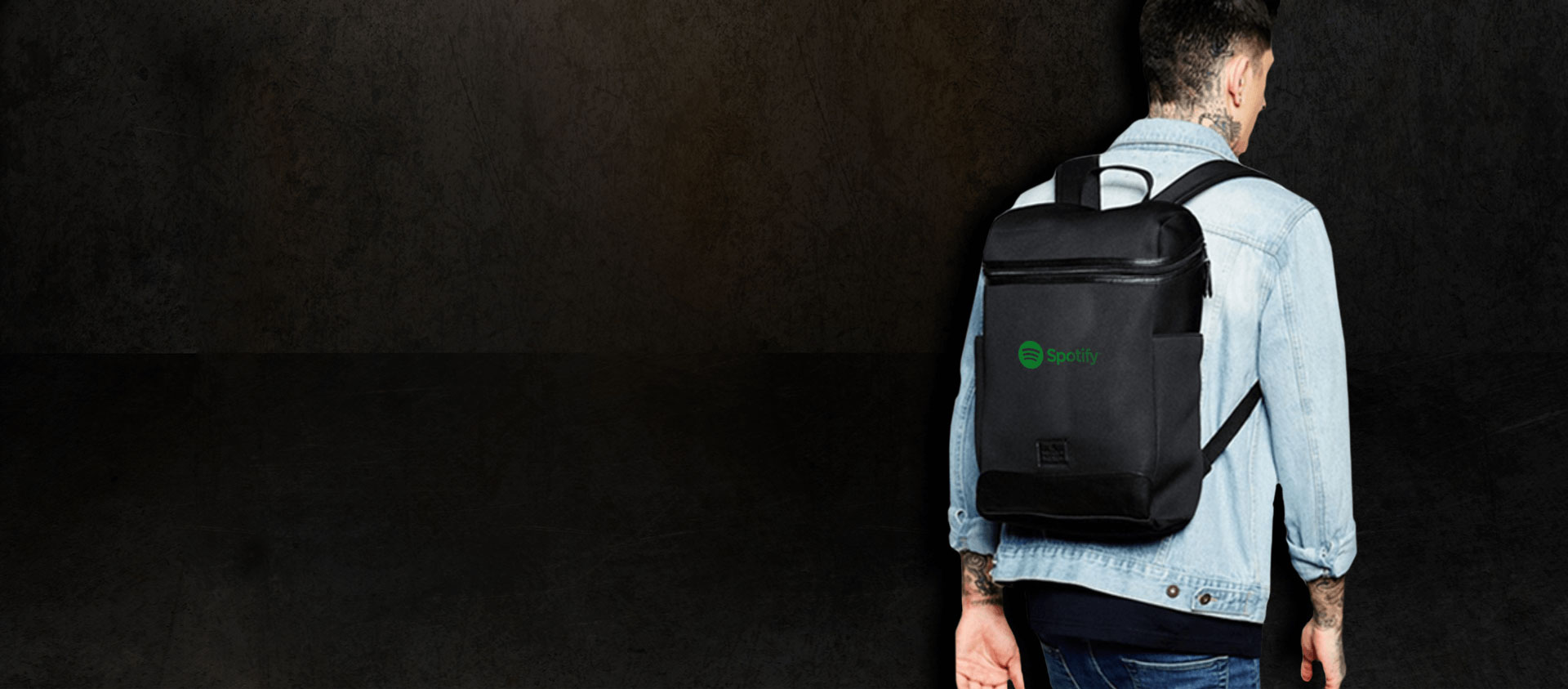 Man wearing a custom printed backpack branded with company design